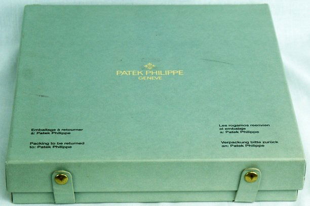 Patek Philippe Vintage Watch Box: Large Patek Philippe box that holds up to 9 wristwatches or pocket watches. This is a vintage shipping box Patek dealers used to send or receive watches from Patek. There are two snap buttons for