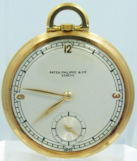Patek Philippe 18k Yellow Gold Pocket Watch: 18k yellow gold Patek Philippe pocketwatch, rare silver "race track" dial with yellow gold Arabic numerals, outside of the case back is monogrammed, inside of the case back has a dedication engraving