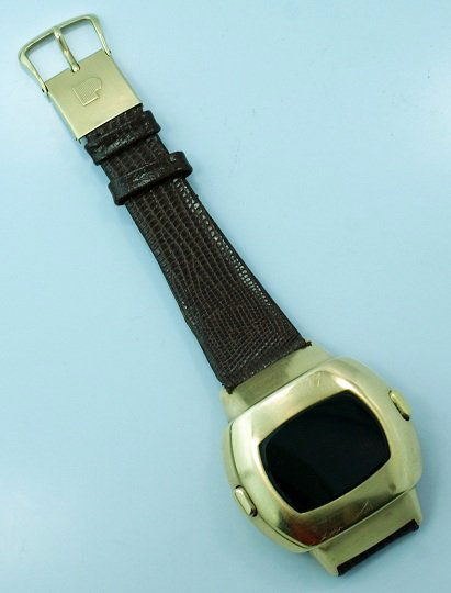 Vintage 14K Yellow Gold Pulsar Digital Wrist Watch: Vintage 14k yellow gold digital Pulsar wristwatch. The case back is stamped "Time Computer Inc 14K Gold Pulsar." The yellow gold buckle is stamped "14KT USA JB."