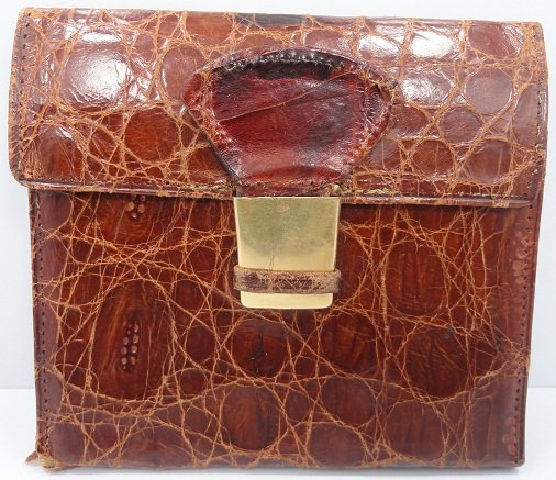 Jaeger Le Coultre Wallet with 18k Gold Buckle: Rare vintage Jaeger LeCoultre alligator or crocodile billfold wallet with various slots for different currencies or denominations. Also has a pocket for storage of your ID card. The buckle is stamped 