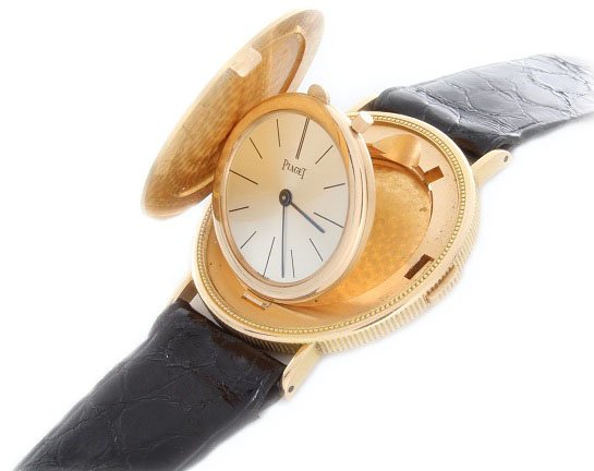 18k Yellow Gold Piaget 20 Dollar Coin Watch Mechani: 18k Yellow gold Piaget $20 1895 dollar coin watch mechanical Piaget movement. It comes on a Piaget strap with a 18k Piaget buckle. The approximate diameter is 35mm.
