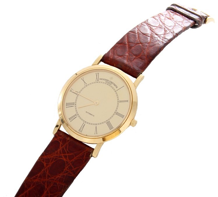 18k Yellow Gold Vacheron Constantin Watch 34170: 18k yellow gold Vacheron Constantin Swiss, ref #34170. Ultra thin Vacheron caliber 1170, automatic movement. The champagne dial with black Roman numerals and railway minute track is in good condition.
