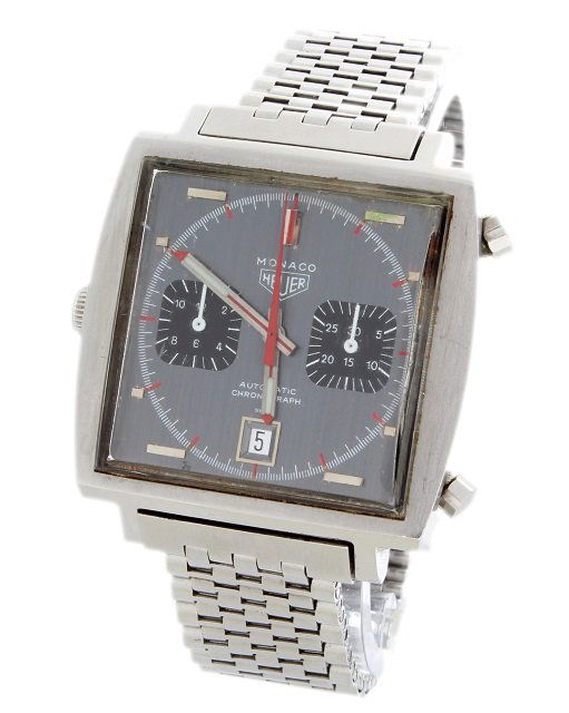 Rare and Unusual Vintage Heuer Monaco Steve McQueen Chr: Gentleman`s stainless steel Heuer Monaco Chronograph wristwatch, automatic movement, grey dial with 2 black painted subsidiary dials, date aperture, signed Heuer, Monaco. The hands are in good origina