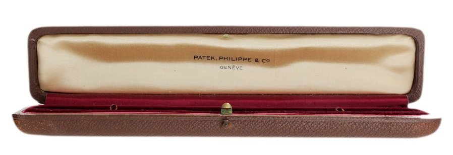 Vintage Patek Philippe Watch Box: Vintage Patek Philippe & Co Geneve wristwatch box. Approximate dimensions 195mm x 40mm x 25mm.