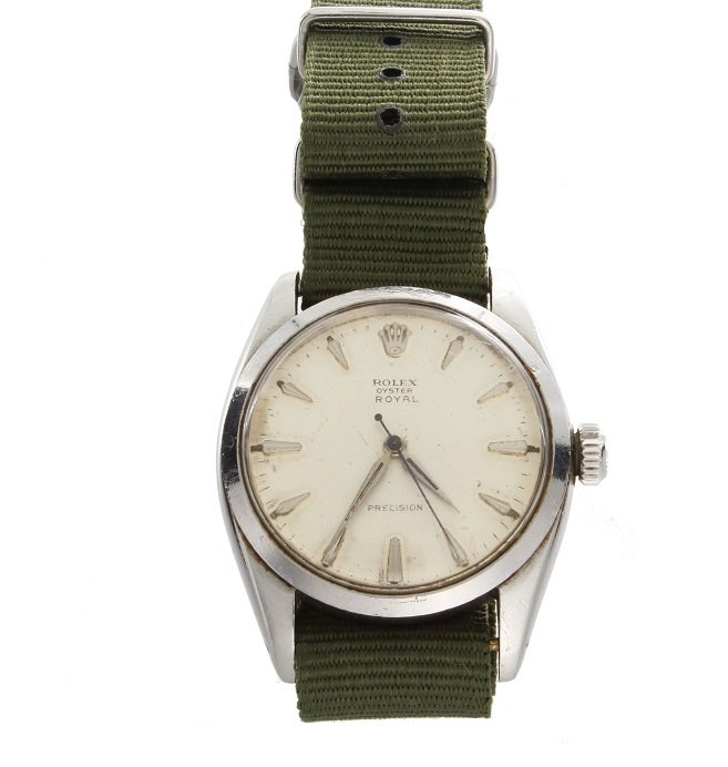 Stainless Steel Rolex Precision Watch #6426: Stainless steel Rolex Oyster Royal Precision wristwatch, ref #6426, silver dial with arrow head hour markers, Swiss made, manual wind movement, comes on an army green NATO strap. Approximate diameter 