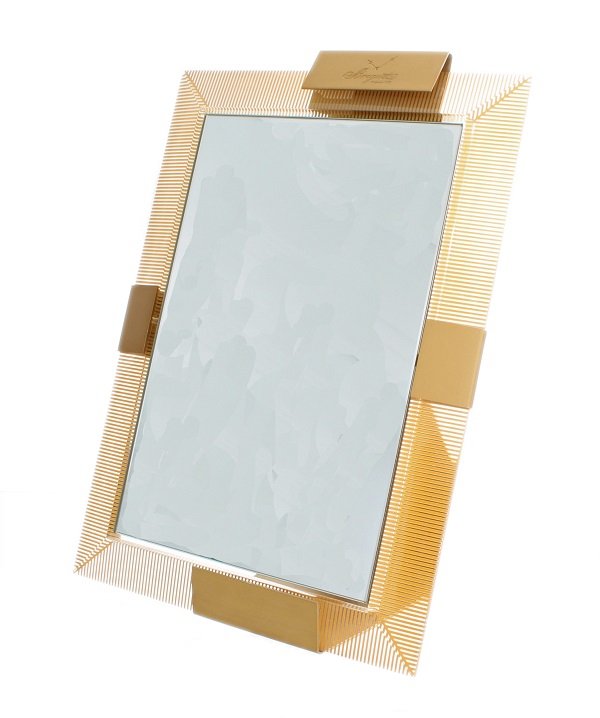 Breguet Authorized Dealer Store Display Mirror: Breguet store display mirror used by authorized Breguet watch dealers. Approximate dimensions are: 10.5 in (H) x 8 - 1/4 (L) x 5-1/4 in (depth of base).