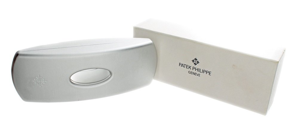 Patek Philippe Ladies 24 Watch Box: Ladies Patek Philippe Twenty~Four wristwatch box. Inner and outer box. Metal exterior with leather interior.