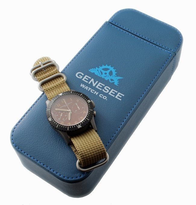 Titanium Special Edition Genesee Watch Co Chronograph: Special edition titanium Genesee Watch Co two register chronograph wristwatch. Titanium with uni-directional black coated bezel. Fixed pin case for easy exchange of NATO straps. Havana colored dial wi