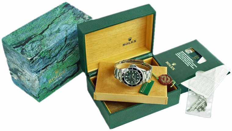 Steel Rolex Oyster Perpetual Submariner Watch #14060: Stainless steel center seconds, men`s Rolex Oyster Perpetual Submariner, water resistant up to 1000 ft = 300 m, Swiss made, wristwatch, ref #14060, circa early 2000`s. It has a 31 jewels Rolex caliber