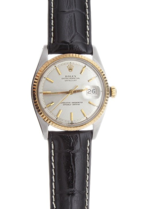 Steel and Gold Rolex Oyster Perpetual Datejust Watch: Stainless steel and yellow gold (tutone) gent`s Rolex Oyster Perpetual Datejust wristwatch with center sweep seconds, ref #1600, circa 1975. Yellow gold fluted bezel. Swiss made, automatic movement. T
