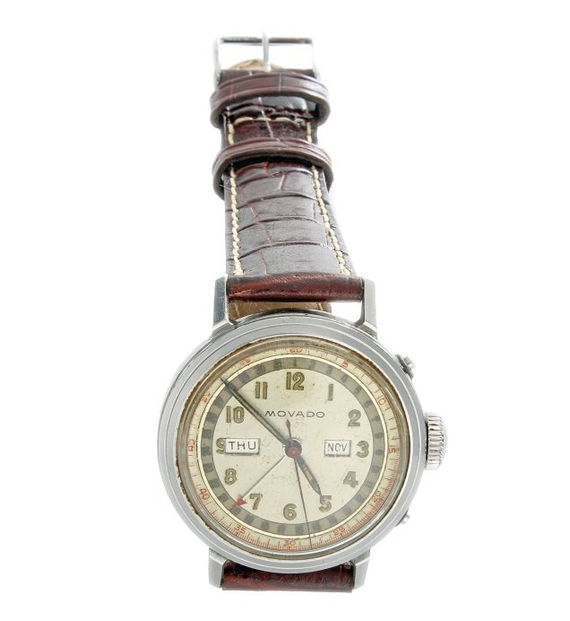 Vintage Gents Movado Day Date Month Waterproof Watch: Vintage stainless steel men's triple calendar day, date, month, Movado wristwatch with waterproof screw back case. Side pushers for quick set advancement of the date hand and month aperture. Nice dial