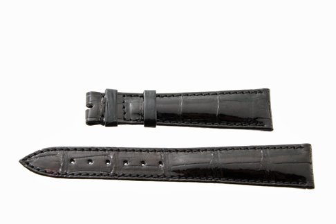 Black Genuine Crocodile Breguet Strap: Black genuine crocodile Breguet strap. The approximate overall length is 190mm. The end piece size is approximately 18.7 mm and the buckle side is approximately 14.5 mm. It appears to be in unworn con