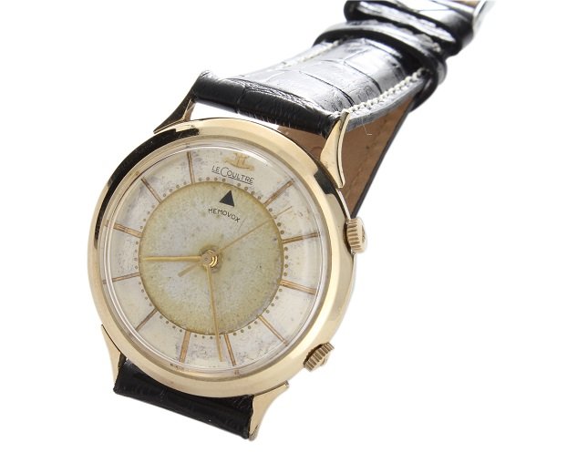 Vintage Tutone Gent`s Jaeger LeCoultre Memovox Alarm: Vintage men`s 10k yellow gold filled and stainless steel LeCoultre Memovox alarm wristwatch. Swiss made, mechanical manual wind movement. Silver Le Coultre dial has patina and spotting through due to 