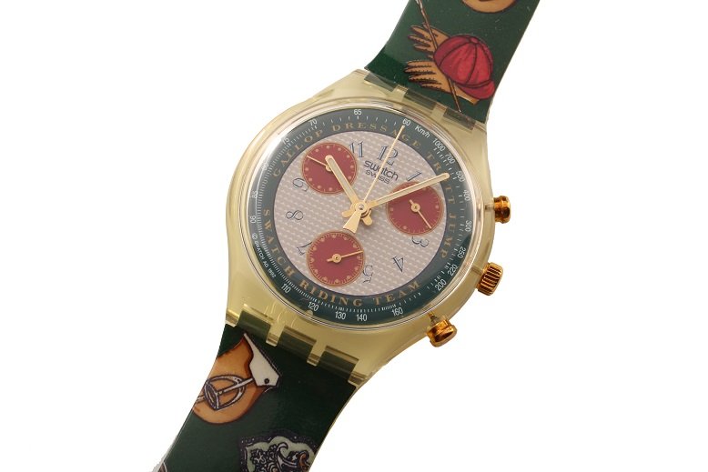 Vintage Swatch Chronograph Riding Team Watch with Box: Vintage Swatch Riding Team chronograph wristwatch. Swatch dial says "Gallop, Dressage, Trott, Jump" with Arabic hour markers and three red registers. See through watch case with gold tone pushers and 