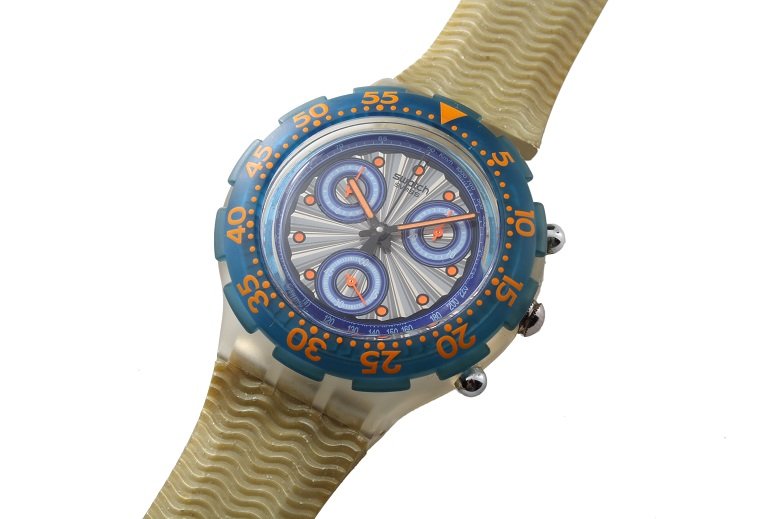 Swatch Chronograph Aqua Chrono Scuba 200 With Box: Vintage Chronograph Aqua Chrono Scuba 200 wristwatch. Grey, blue, and orange Swatch dial with three registers. Water resistant up to 200m. Swiss made, quartz movement. See through case back. Accompani