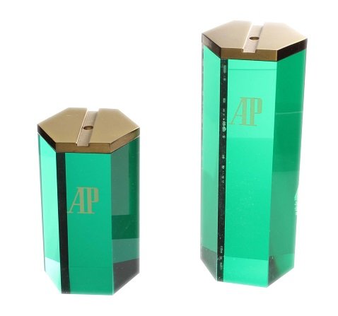 Set of 2 Audemars Piguet Official Dealer Watch Display: Set of two Audemars Piguet authorized dealer wristwatch display stands. Clear acrylic with a green back and gold tone top. No cuffs, only the AP watch stands as shown. Light superficial scratches due 