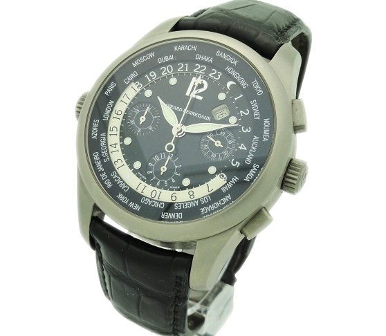 Titanium Girard Perregaux World Time Chrono Watch: Men's titanium Girard Perregaux World Time chronograph wristwatch, ref #4980. Swiss made, automatic self winding movement. Exhibition see through case back. Comes on a black strap with a titanium depl