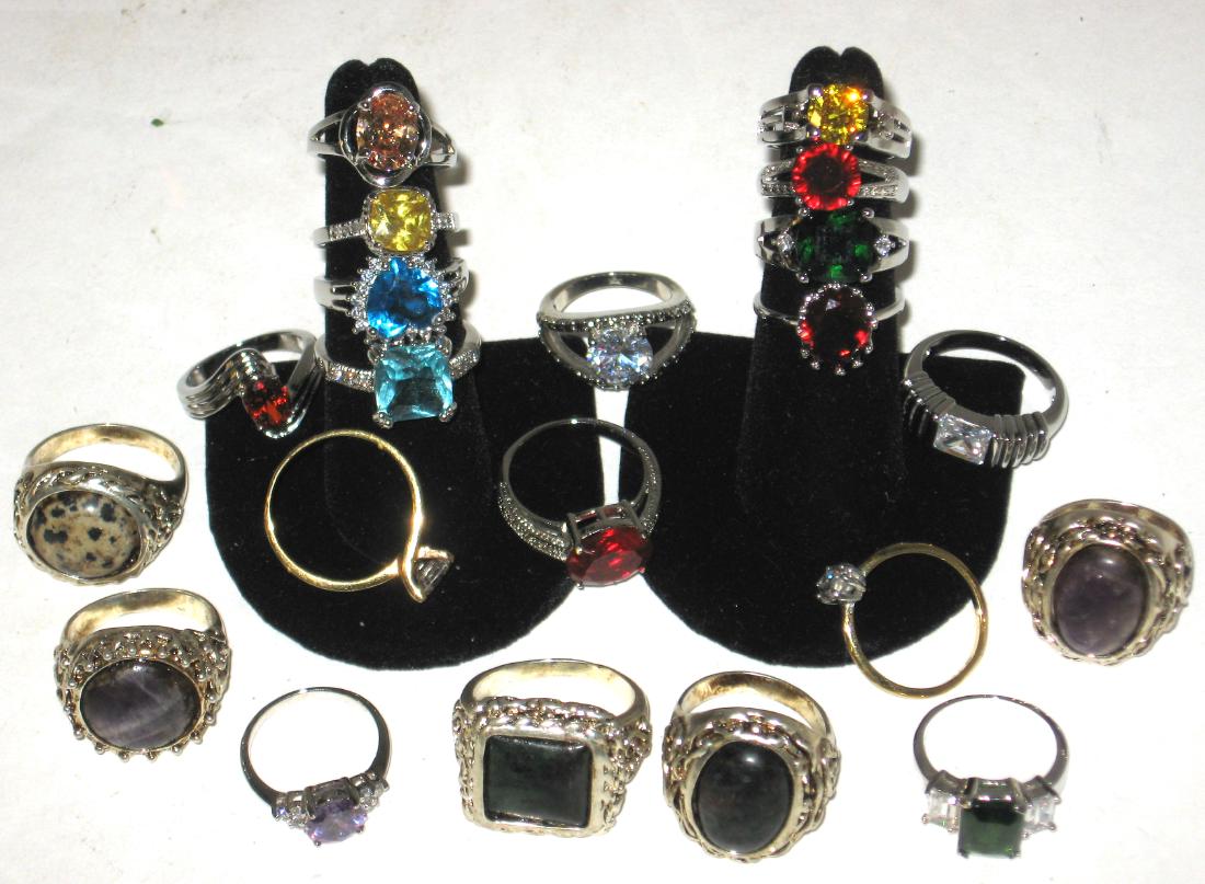 Group of 21 costume jewelry rings,: with various colored stones. Condition: good, commensurate with age.