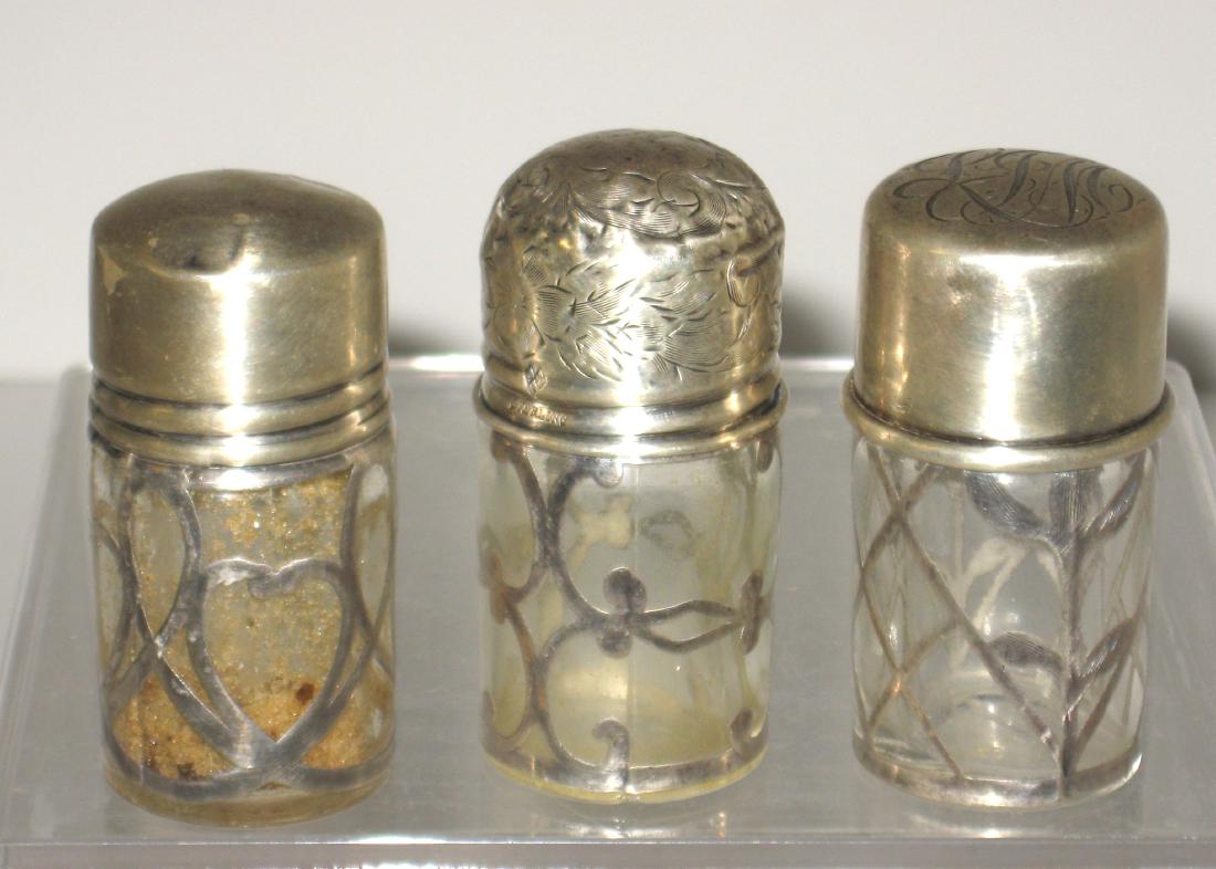 Three silver overlay cologne bottles, (1 of 3)