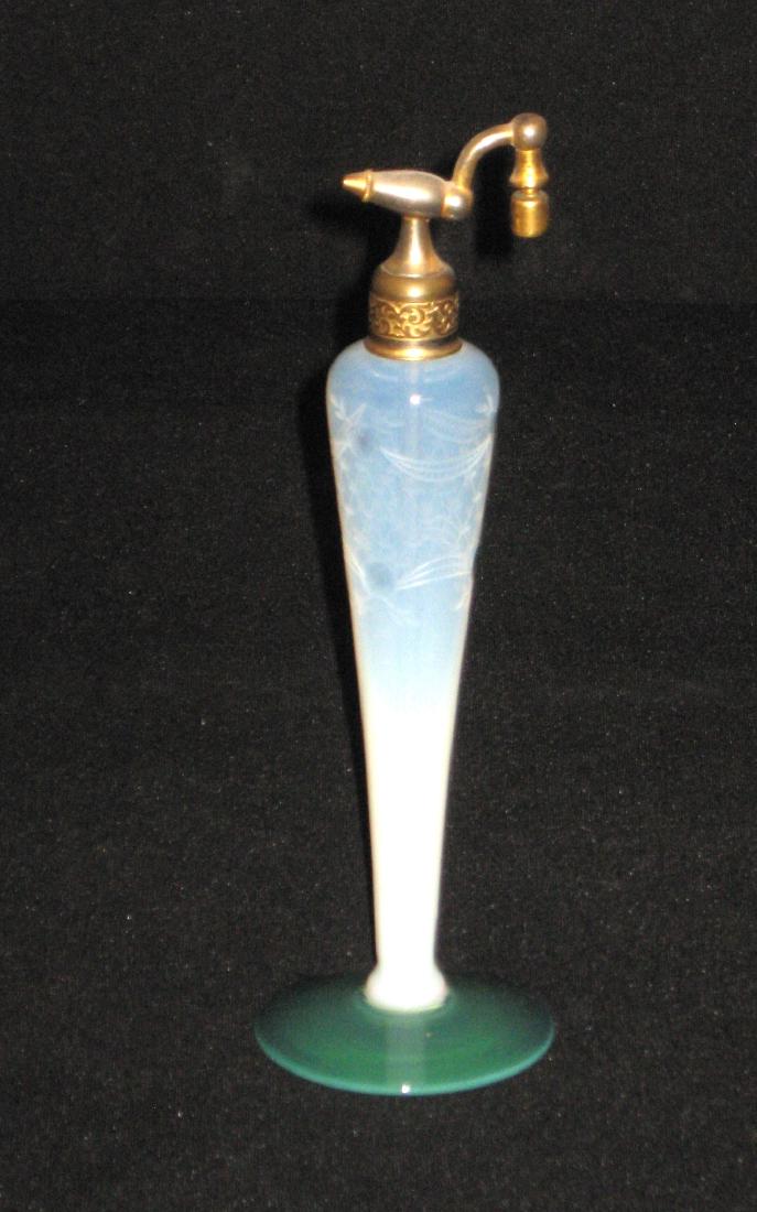 Fry Jade and opalescent atomizer,: Jade foot extends up an opalescent body with cut bands and flowers, 8' ht. Condition: good, with no chips, cracks, or repairs.