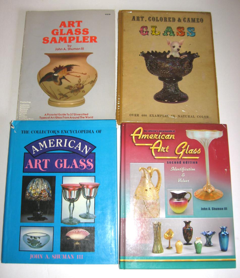 Four Art glass books: Including three by Shuman "Art Glass Sampler" 1978, "American Art Glass" 1988, "American Art Glass" second Edition2006, and "Art, Colored and Cameo Glass" by Whitlow. Condition: ware to dust jackets