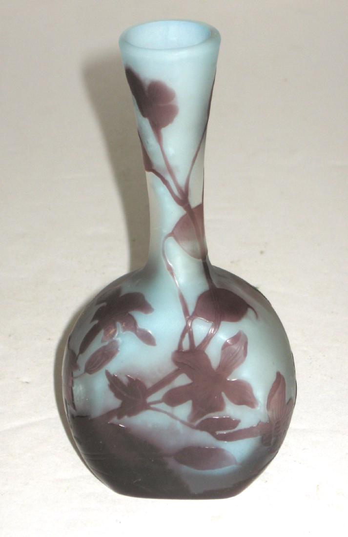 Galle French cameo glass vase: Banjo form with purple foliage set against a blue background, signed in cameo Galle, 5 1/2' ht. Condition: Good with no chips, cracks, or repairs.