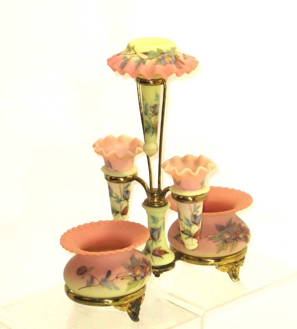 Magnificent Webb Burmese Epergne: Consisting of a six piece Burmese glass set with two scalloped rim bowls three matching posy vases and a matching standard caddy, both bowls acid stamped Thomas Webb and Sons, 10 1/2" ht. Condition: g