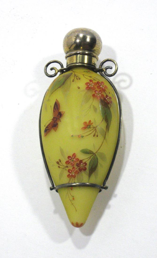 Webb tear drop glass perfume bottle,: Yellow satin glass bottle decorated with a butterfly and red flowering foliage set with a silver frame with British hallmarks and Thornhill New Bond Street London, 4 1/4' ht. Condition: good with no i