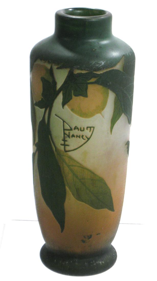 Daum Nancy French cameo vase,: Cylindrical shouldered form in mottled orange and blue decorated with orange Persimmons on green leafy stems, signed in cameo Daum Nancy, 9 1/2" ht. Condition: crack to the body but show well in brigh