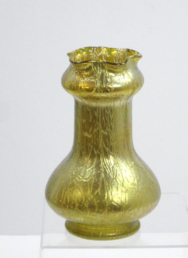 Loetz art glass vase,: Bulbous corset form with a scalloped rim in iridescent gold with a Mimosa finish, 7 1/4' ht. Condition: good with no defects found.