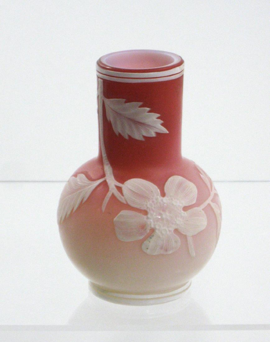 Peachblow cameo glass vase,: Bulbous smoke stack form in white to rose decorated with a cascading flowering branch, signed with an acid stamp Thomas Webb, 4 1/2" ht. Condition: good with no defects found