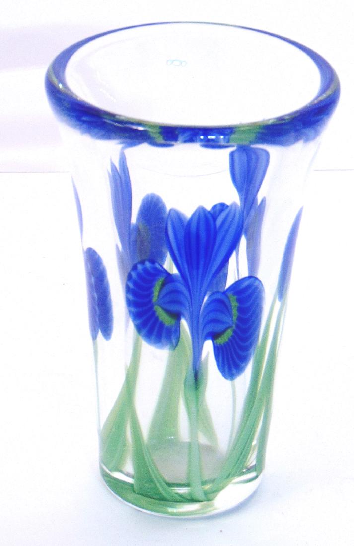 Orient and Flume glass vase: Tumbler form in clear glass decorated with blue iris on green stems, signed OF 60105 and carries a paper label, 6 1/2" ht. Condition: good with no defects found