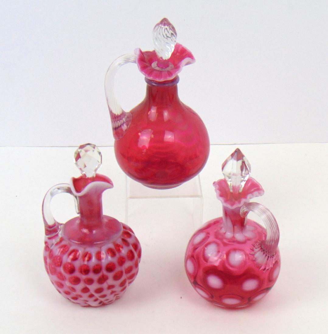 Three cranberry glass cruets (1 of 4)
