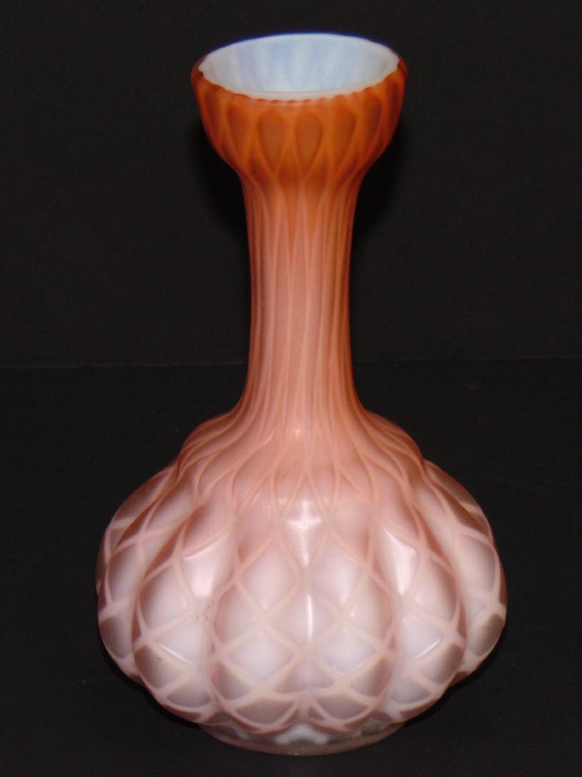 Peach MOP diamond quilted stick vase: Melon ribbed stick vase in Peach MOP, 6 1/2" ht. Condition: good with no defects found