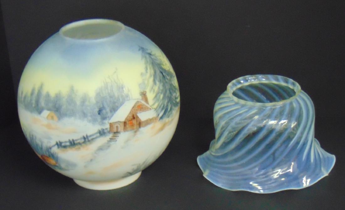 2 Victorian Lamp Shades: Including a white opalescent shade with a 4" fitter, together with an enamel globe with a 4" fitter, Globe 9" ht. Condition: minor chips on the fitters.