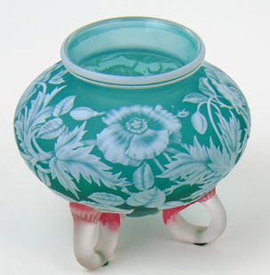 Rare Webb Green Footed Cameo Vase: Magnificent footed greenish blue cameo glass vase decorated around with a flowering branch and adorned with three red to clear C feet, 4" ht. Condition: good with no defects found