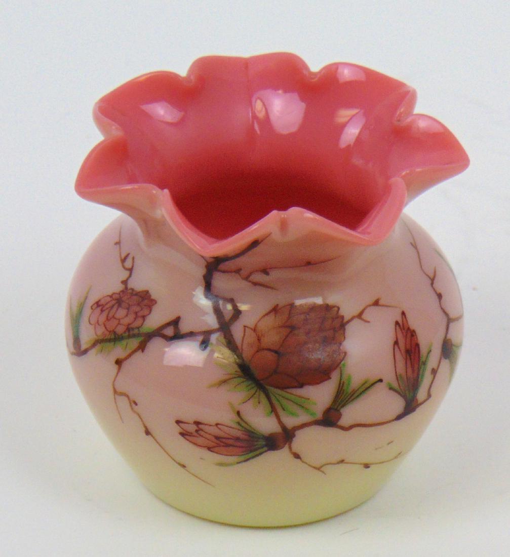 Webb Burmese rose bowl with acorns: Glossy finish diminutive vase decorated with branches of acorns, marked Thomas Webb and Son's, 2 1/2" ht. Condition: good with no defects found.