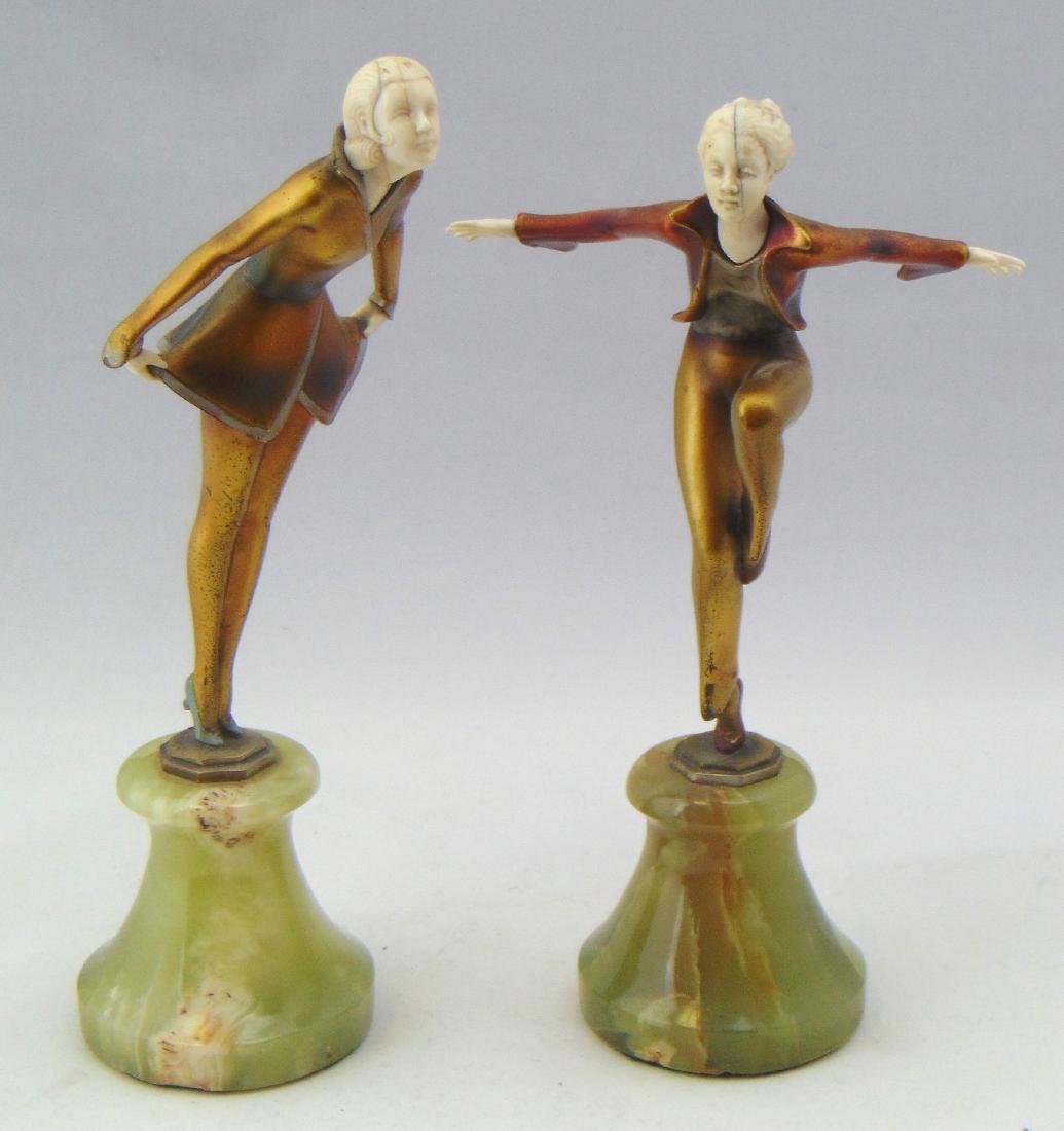 Pair of Lorenze Art Nouveau sculptures: Each of a dancing women, both signed Lorenz, 9 1/2" ht. NOTE: we are not sculpture experts please make you own decision on quality, material and age. Condition: wear commensurate with age