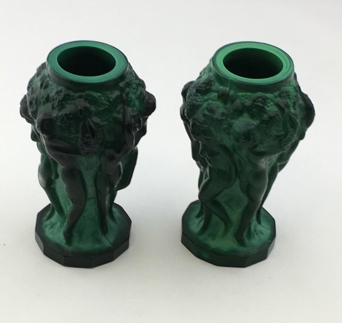 Pair of Bohemian glass vases: Pair of green Malachite vases each with figural nudes made by Schlevogt Ingrid circa 1935, 5 1/4' ht. Condition: good with no defects found.
