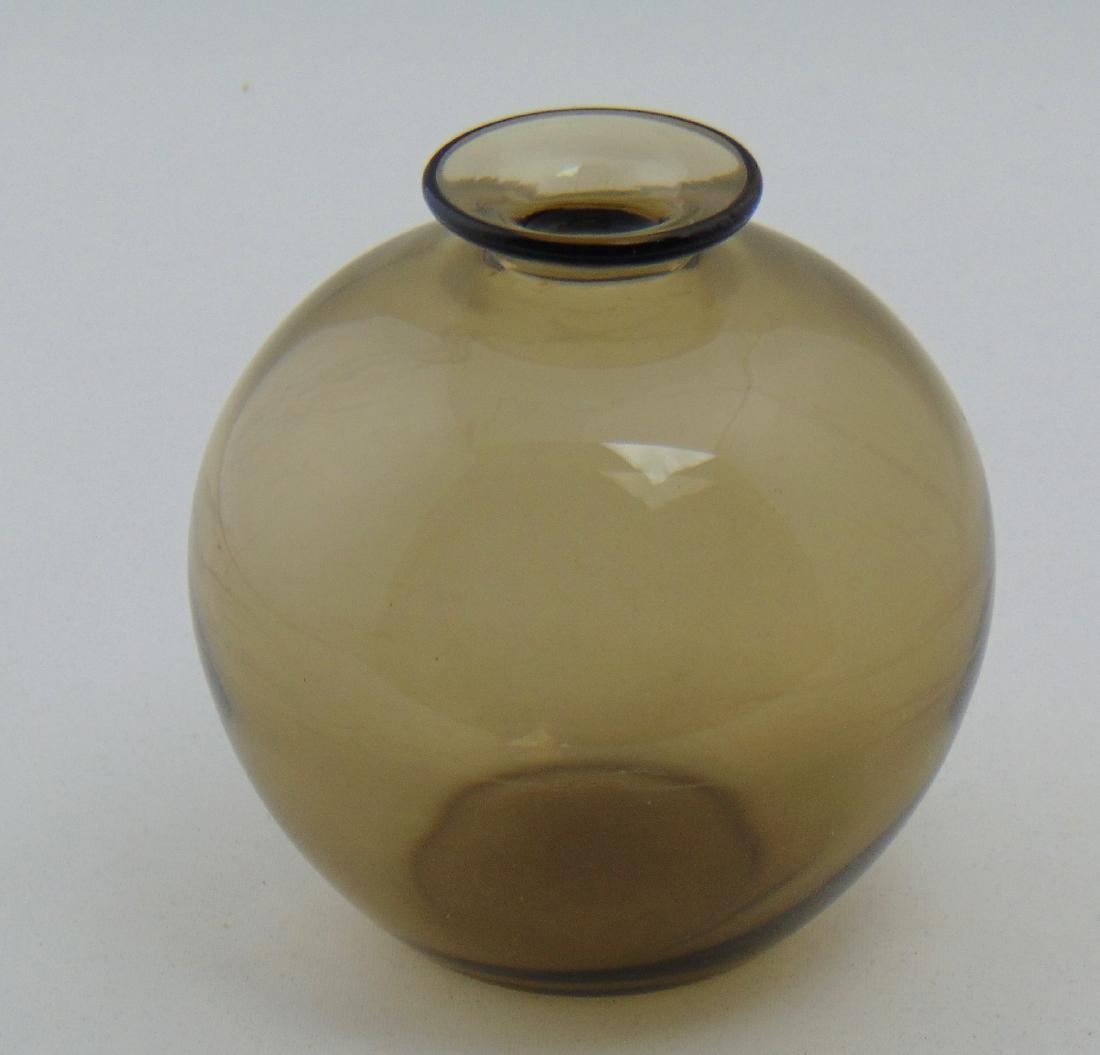 Daum green glass vase: Ovoid form in a smoke green, signed Daum Nancy France, 4 1/4" ht. Condition: good with no defects found.