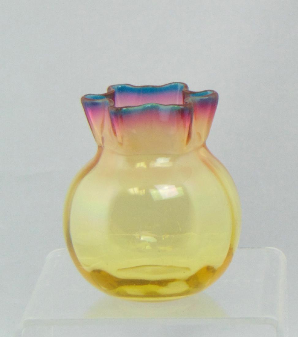 Webb Alexandrite glass toothpick: Bulbous form with a star top shading from amber to rose to blue, 3" ht. Condition: good with minor scratches.