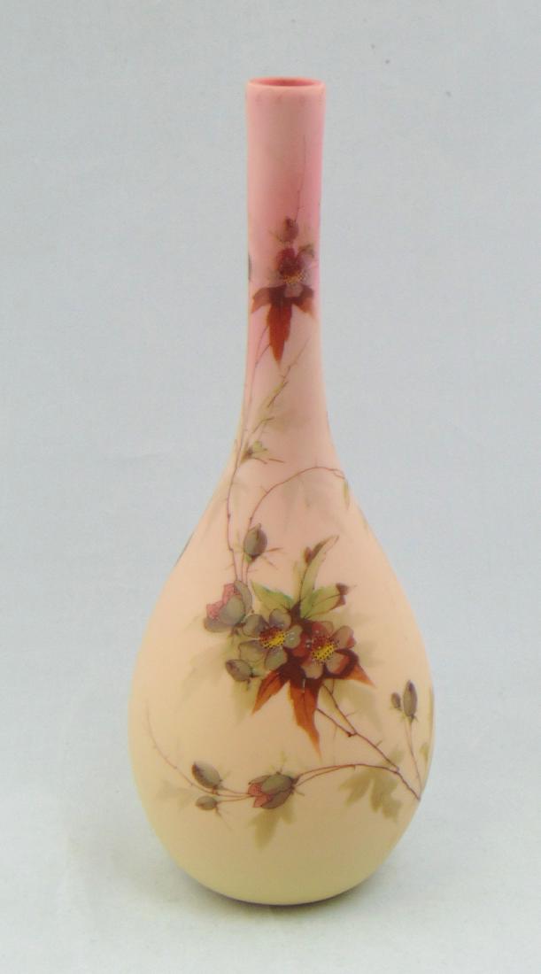Queens Burmese glass stick vases: Bulbous stick form in cream to rose decorated with clusters of stemmed flowers in the Hawthorn patter, acid stamp Thomas Webb and Sons, 12 1/2" ht. Note: We rarely see Queens Burmese in this tall size