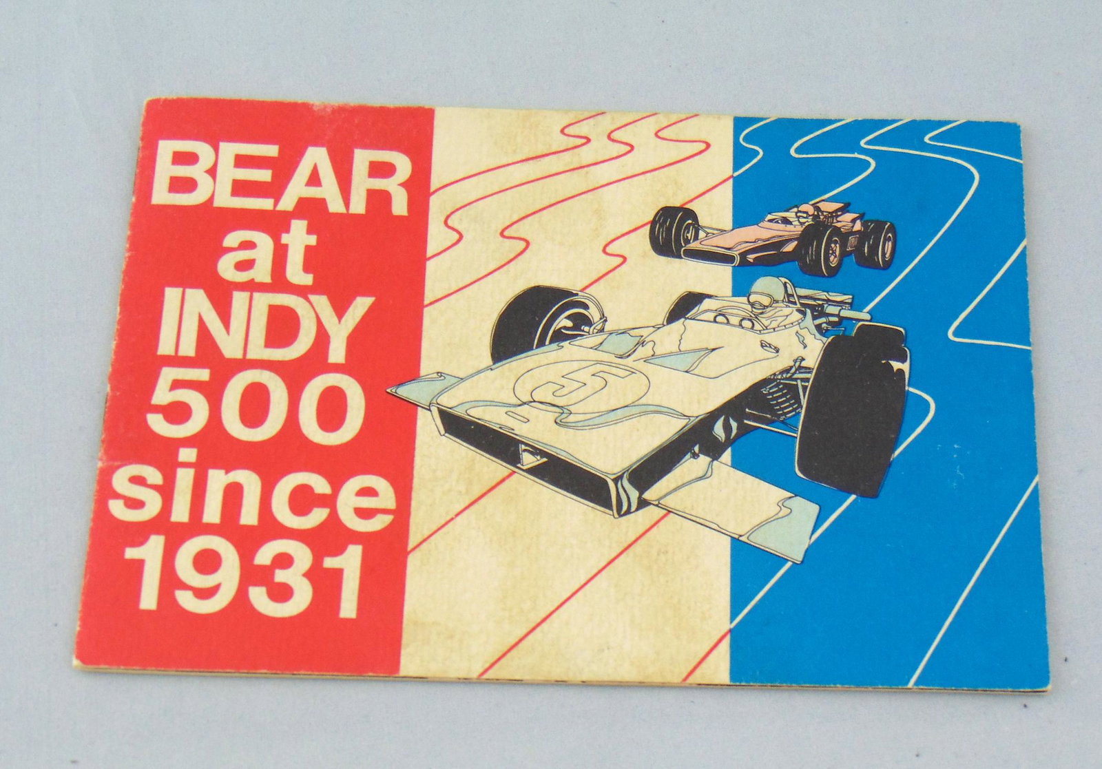 1969 autographed Indy booklet: Booklet circa 1969 "Bear at Indy 500 since 1931" autograph on back by Bobby Unser, Wally Dallenback, Bill Simpson, Mario Andretti, and Roger Ward. Condition: good with no defects found