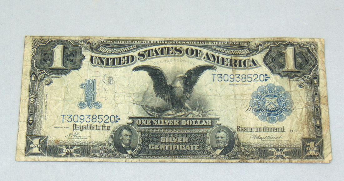 1899 one dollar bill: Silver Certificate from 1899, Condition: good to very good with creases.