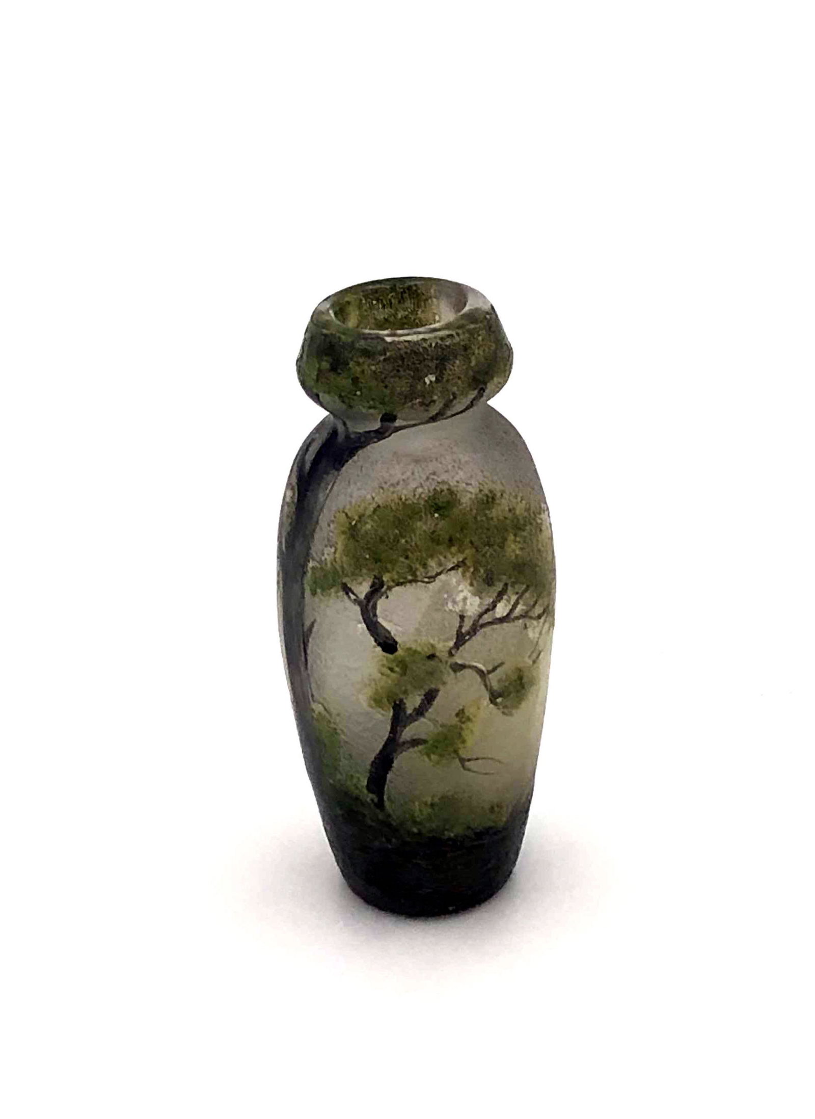 Muller Freres cameo glass vase: Cylindrical form in frosted glass decorated with a tree scene, signed Muller, 3 3/4" ht. Condition: good with no defects found.