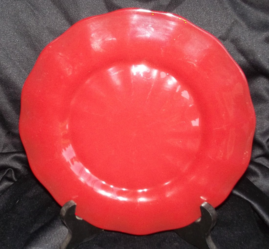 Steuben opaque red glass plate: .Very rare Steuben Cadmium Ruby plate. Dichroic plate changing from opaque to translucent unique to Carder, see "A guide to Colored Steuben Glass by Ericson 1965. NOTE: Appraised at the Antique Road S