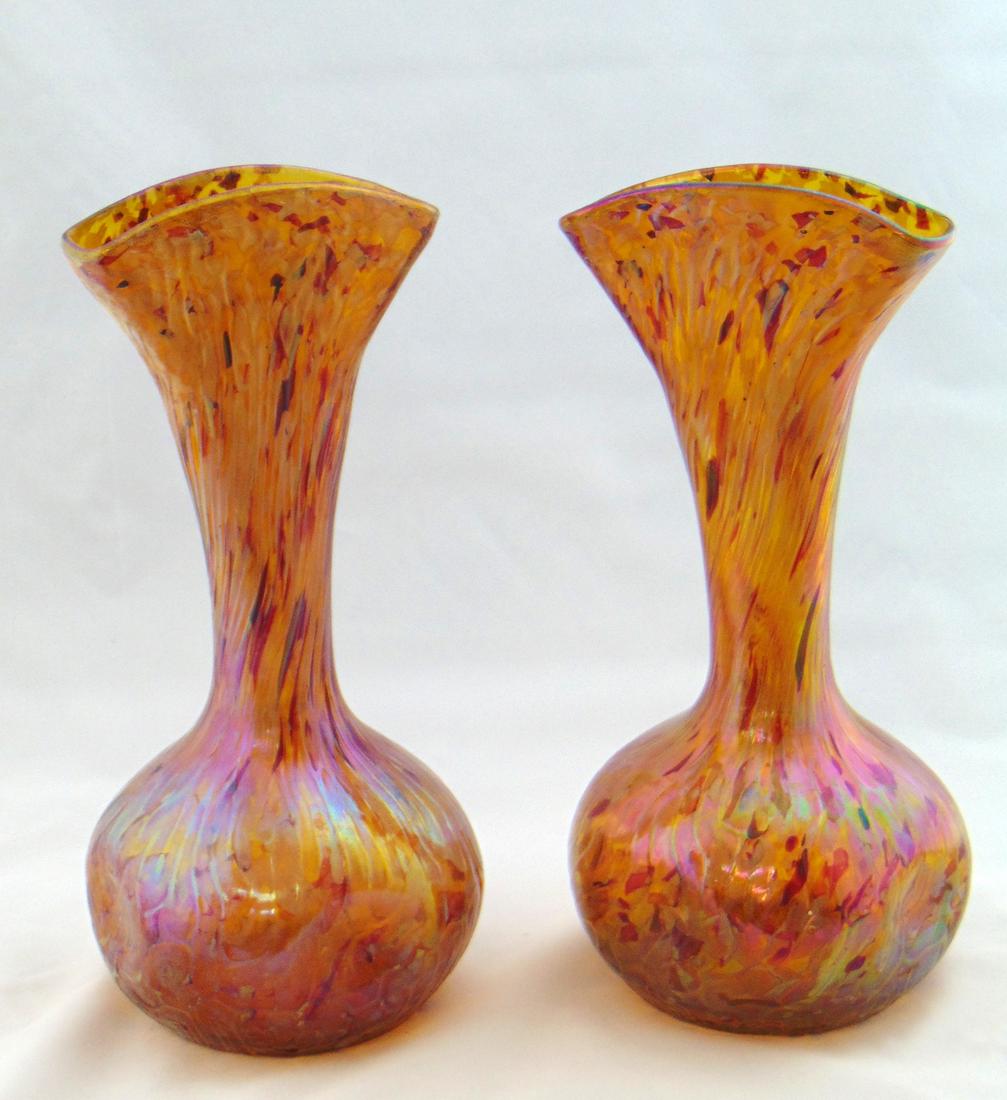 Pair of Loetz glass vases: Pinched sided fan vases in iridescent gold with an undulating decor and a colorful confetti design, 12" ht. Condition: good with no defects found.