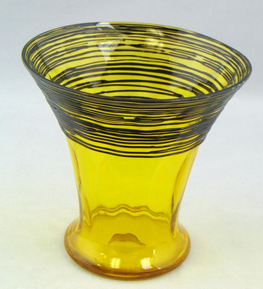 Steuben Bristol Yellow threaded vase: Optic diamond pattern yellow vase with black threading, marked with the Fleur de-Lis, 7" ht. Condition: good with no defects found.