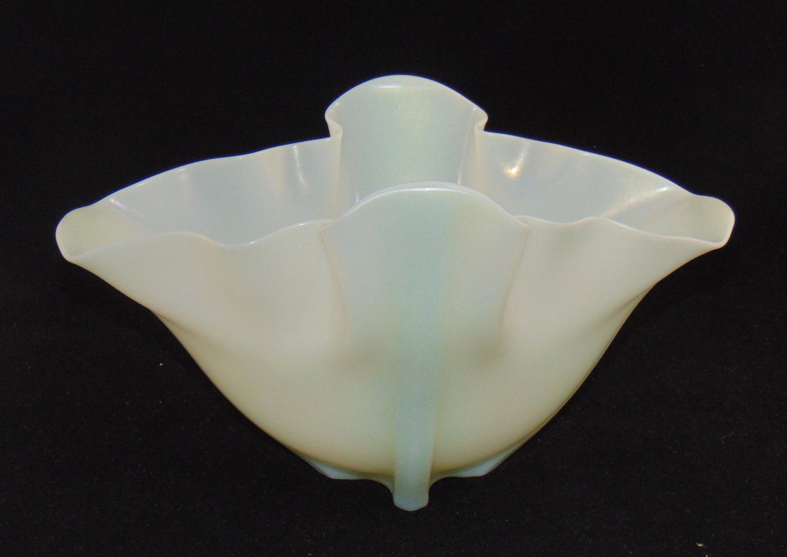 Steuben Ivrene glass Grotesque vase: Shell form grotesque Ivrene glass vase in an Art Deco style, shape 7535, signed Steuben, 12" long. PROVENANCE: Earlys Auction to the Black Collection. Condition: good with no defects found.