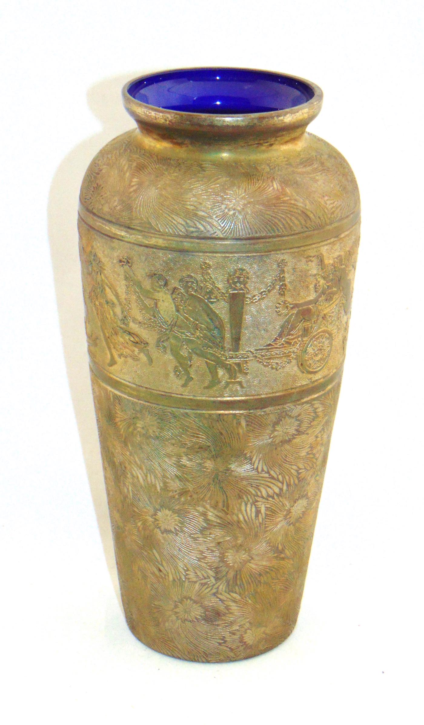 Val St. Lambert metal and glass vase: Unusual cameo glass vase, cobalt blue shouldered form vase decorated with metal overlay band of Romanesque dancing figures, overall needle etched background, signed Val St Lambert, 10" ht. Condition: 